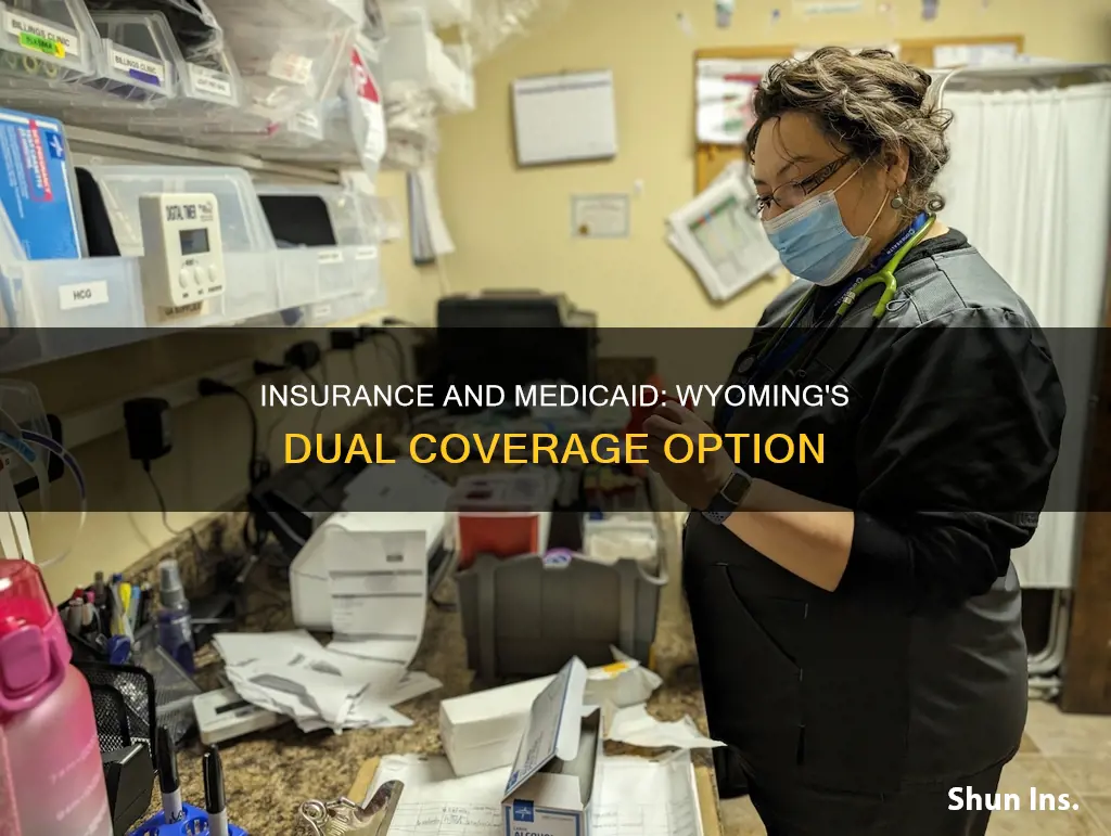 can you have insurance and use medicaid in wyoming