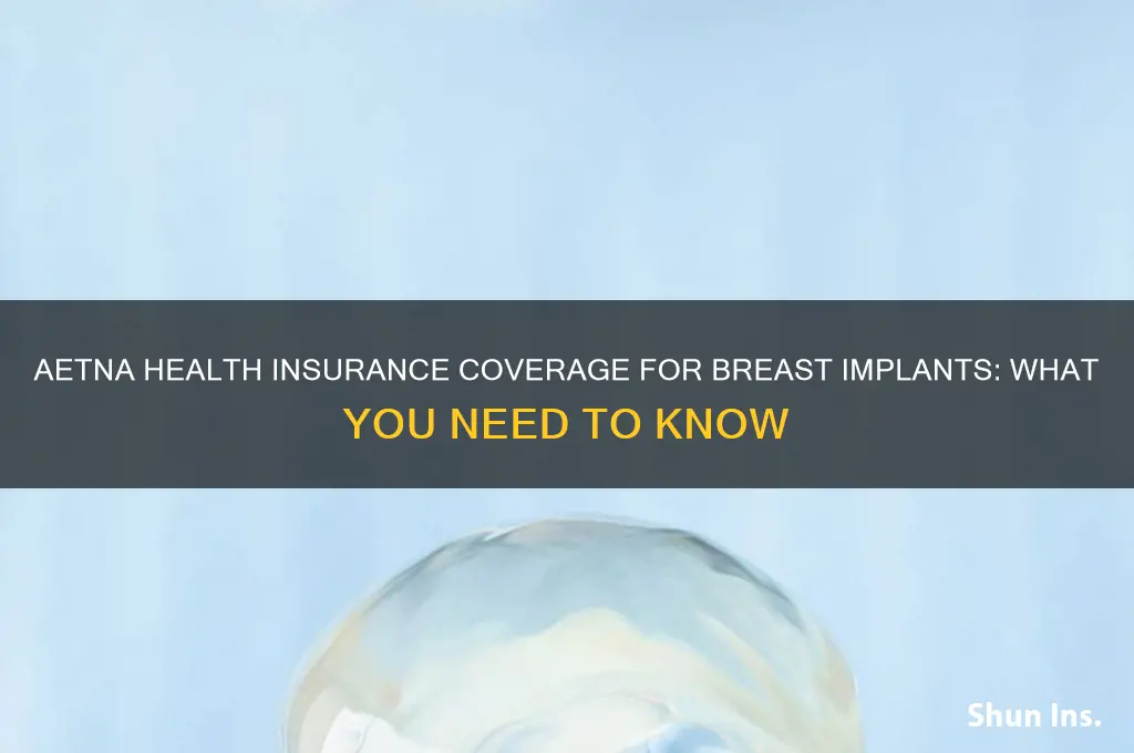 does aetna health insurance cover breast implants