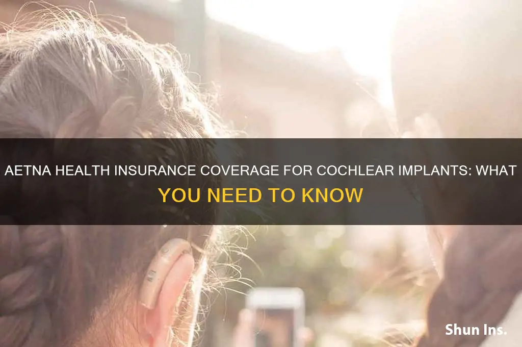 does aetna health insurance cover cochlear implant