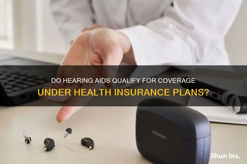 does any health insurance cover hearing aids