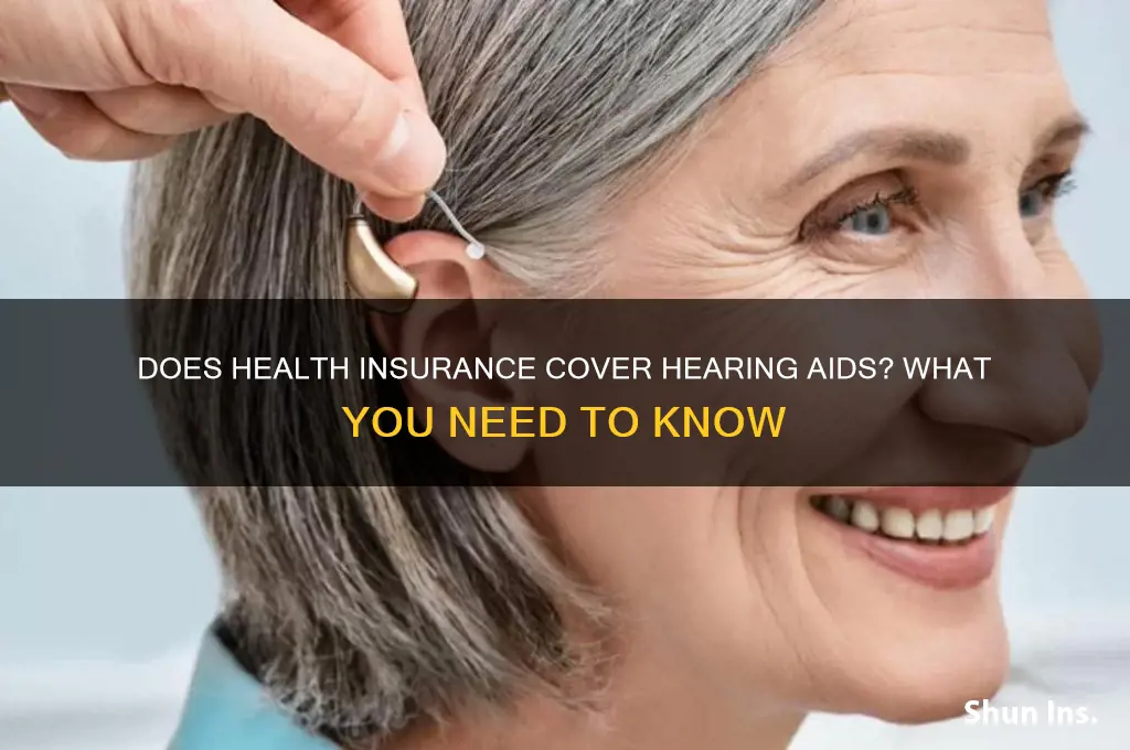 does health insurance cover hearing aids