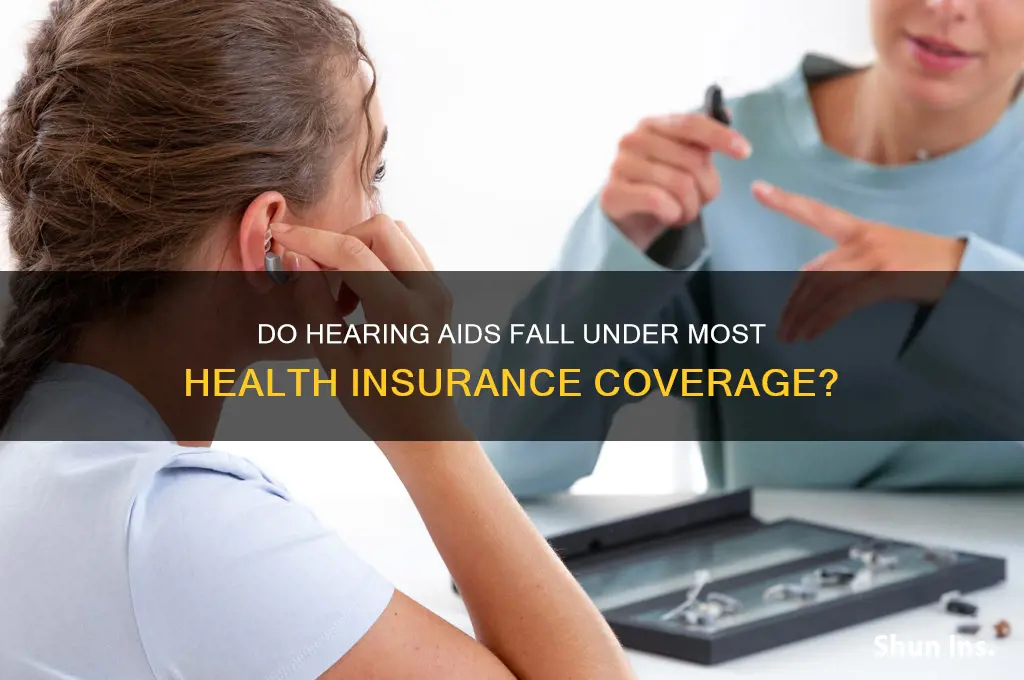 does most health insurance cover hearing aids
