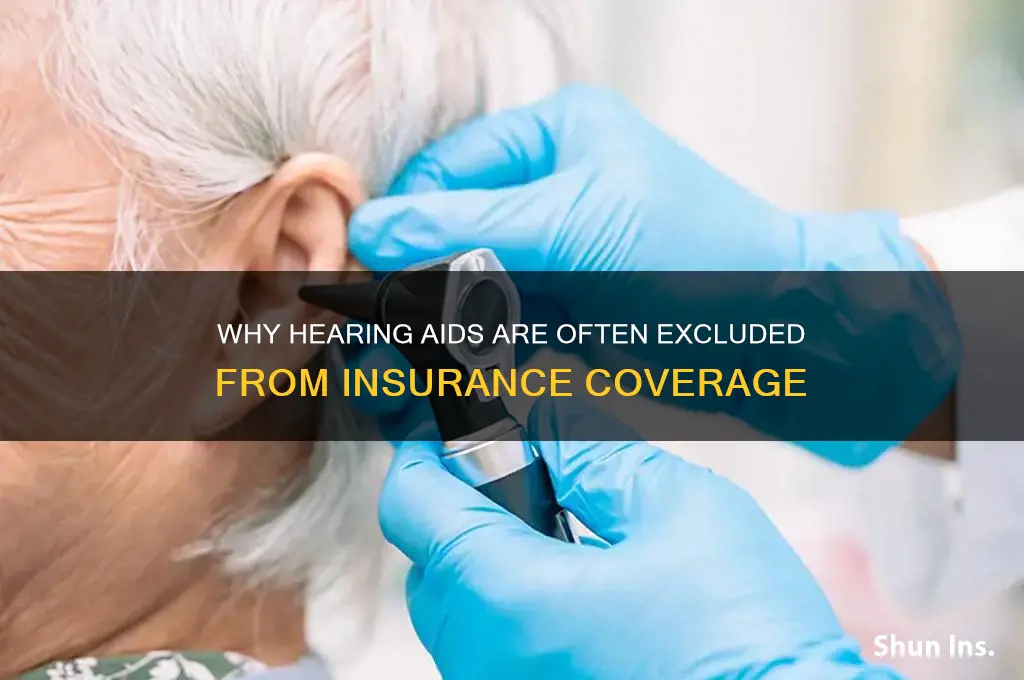 why do insurance companies not cover hearing aids